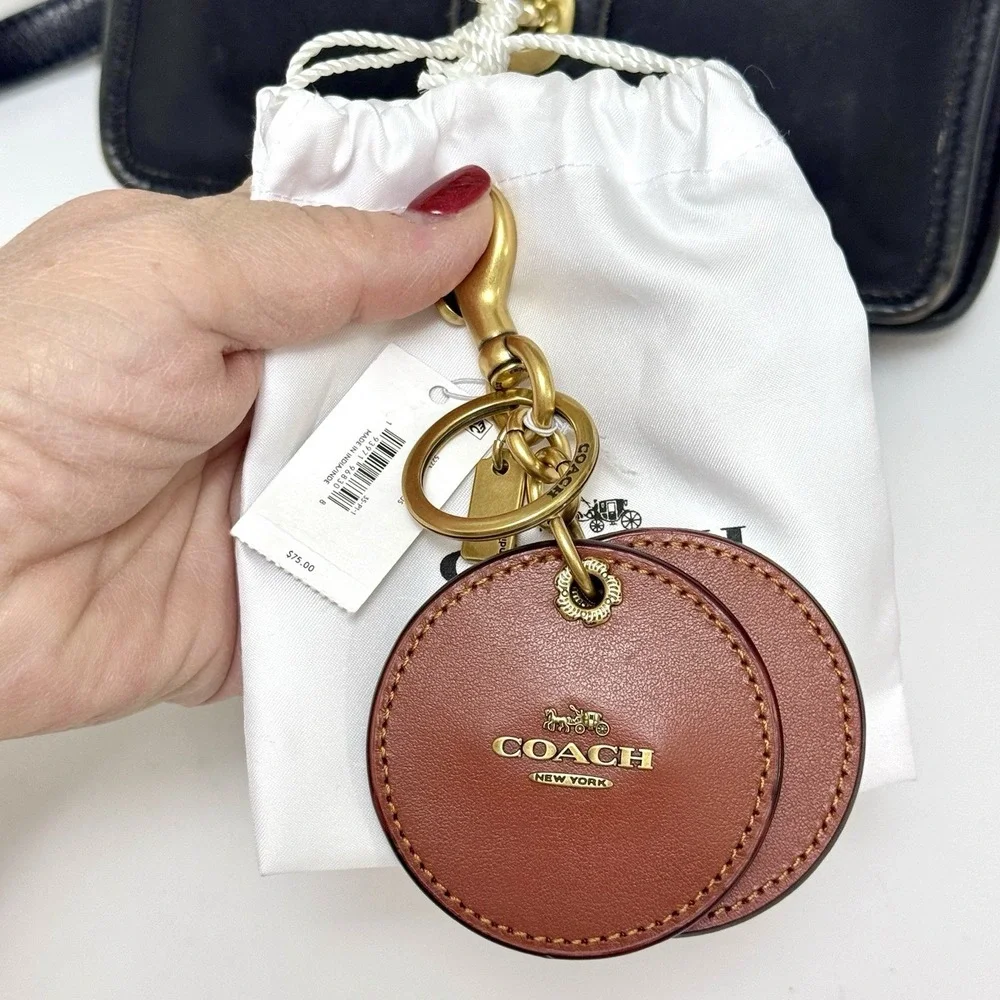 Coach round mirror